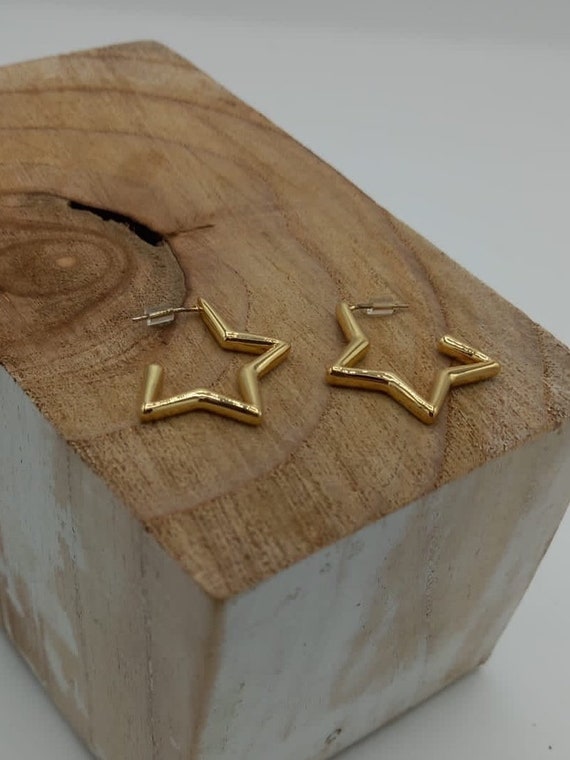Next star earrings best sale