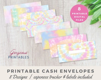 May include: Eight printable cash envelopes with a tie-dye pattern in shades of pink, blue, and yellow. The text "Gorgeous Printables" is at the bottom of the image. The text "8 Printable Digital Files" is in a pink circle at the top right of the image. The text "Printable Cash Envelopes 8 Designs / expenses tracker & labels included" is at the bottom of the image.