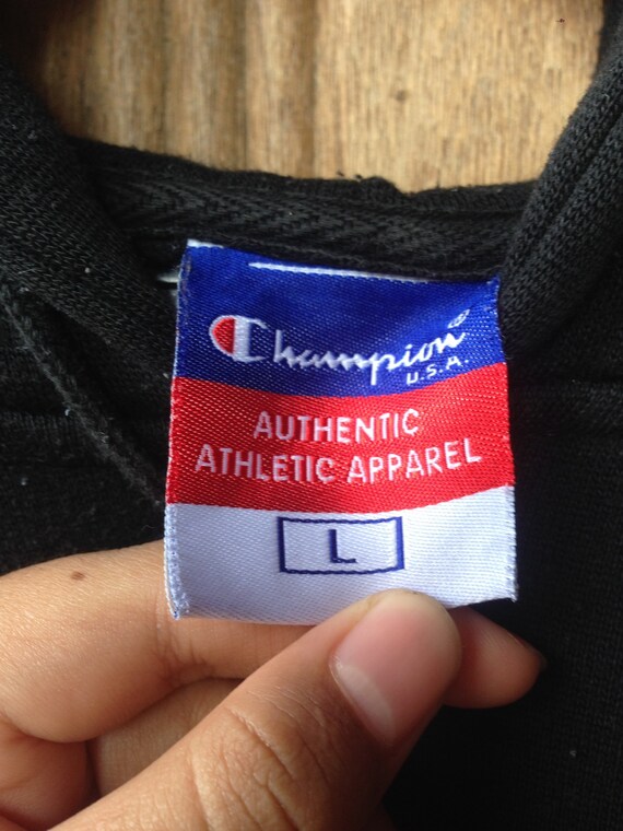 Champion hoodie tag sales