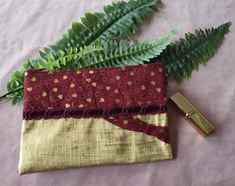 pochette trousse maquillage soin femme AMOUR et DOUCEUR en simili cuir doré, noeud en tissu coeur bordeaux doré galon velours st valentin