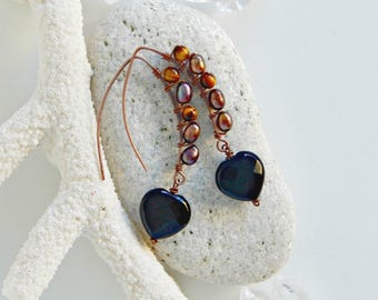 Ellipse-shaped earrings with natural onyx and tiger's eye stone weaving