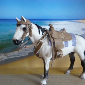 Western saddle set in Schleich size, light-colored leather