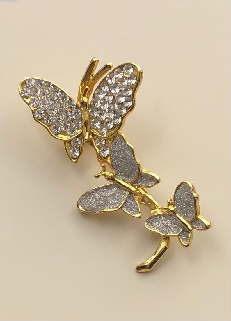 Adorable vintage three butterflies brooch