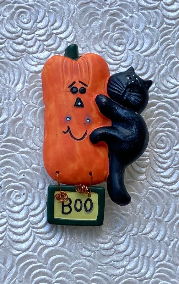 Vintage black cat on pumpkin Halloween brooch