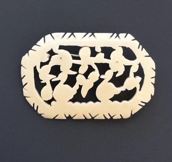 Unique vintage celluloid duck brooch