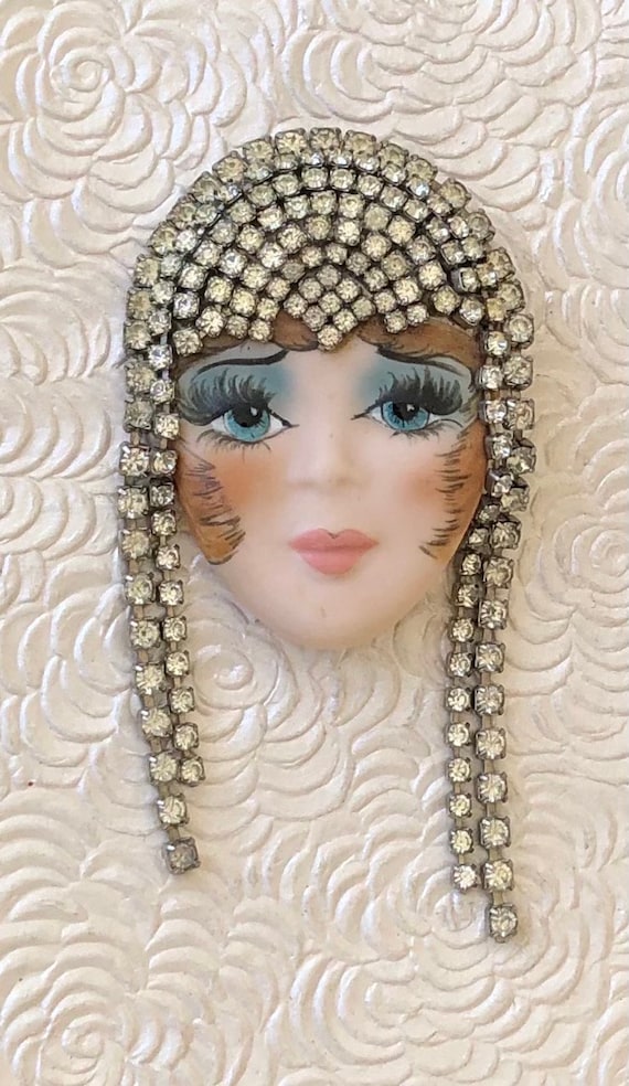 Painted lady face brooch Gem