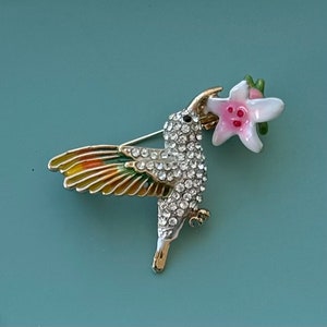 Adorable vintage style hummingbird  on flower brooch