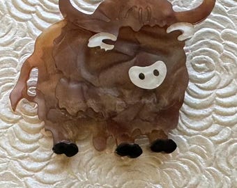 Broche único de bisonte en acrílico