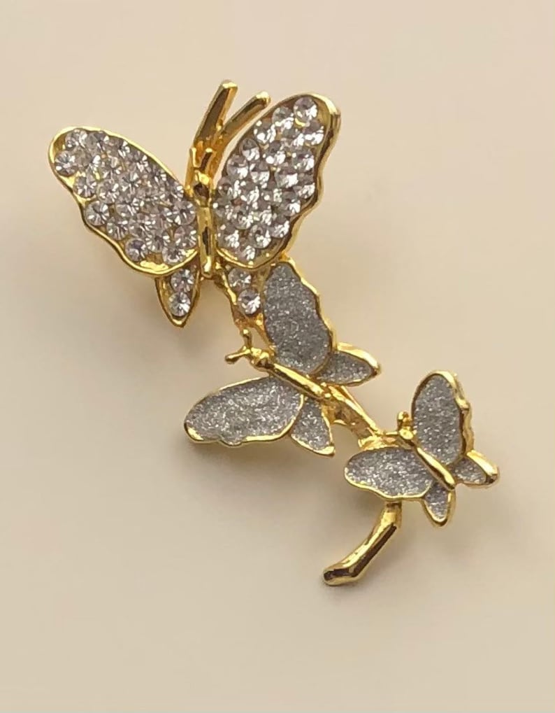 Adorable vintage three butterflies brooch