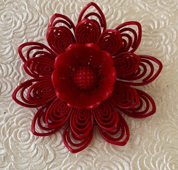 Unique vintage celluloid flower brooch