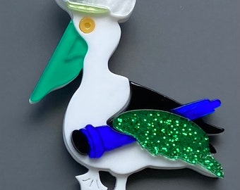 Adorable  pelican with fish vintage style brooch