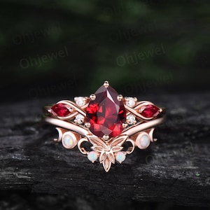 Pear shaped red ruby ring 6 prong vintage unique ruby engagement ring cluster rose gold opal ring leaf Celtic knot wedding ring set women