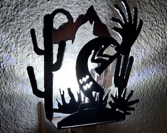 Kokopelli Night Light made out of Rusted Steel Multi-layer desert scene