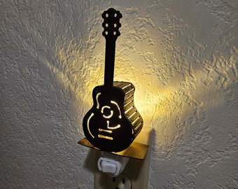 Guitar Night Light- made out of Durable Steel with a Dark Bronze-like Finish.