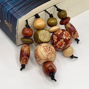 Wooden bead bookmarks. Various styles that make great gifts for coworkers, friends, teachers and all book lovers.