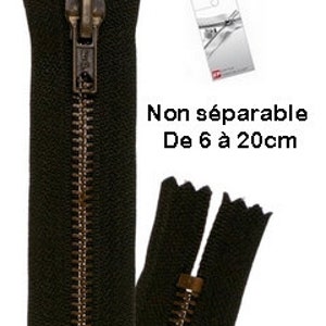 May include: A black zipper with a bronze-colored pull and teeth. The zipper is shown both closed and open, with a tag in the background. The text "Non séparable De 6 à 20cm" is visible on the image.