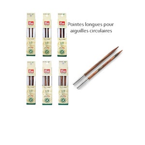 Peut inclure: Six paquets d'aiguilles à tricoter en bois avec des pointes métalliques. Les paquets sont étiquetés avec la marque "Prym" et la taille des aiguilles en millimètres. Le texte "Pointes longues pour aiguilles circulaires" est imprimé sur un fond blanc.