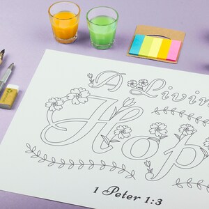 May include: A coloring page with the words "A Living Hope" and the Bible verse "1 Peter 1:3". The page features a decorative floral design around the words.