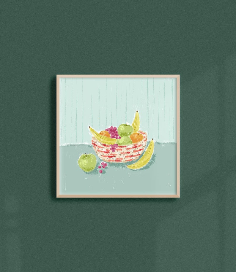 May include: A red and white striped bowl filled with fruit, including bananas, apples, and oranges. The bowl is sitting on a light blue surface.