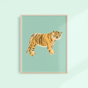 May include: A framed illustration of a tiger with orange and black stripes standing on a light blue background.