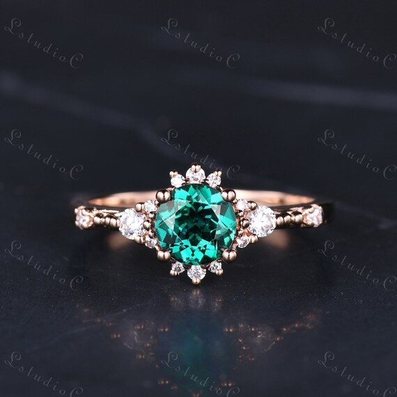 Small emerald deals engagement ring