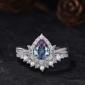 Anillo de compromiso con perlas y alejandrita talladas en forma de pera, engastado en plata y oro blanco, con banda retorcida, piedra natal de junio, anillo con forma de lágrima que cambia de color.