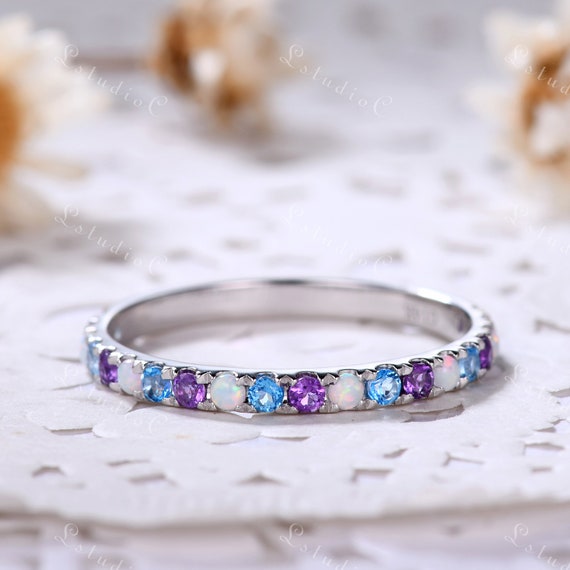 Sterling Silver Amethyst, Blue Topaz, Opal & Peridot Textured 4 Band Ring Set Sterling Silver Amethyst, Blue Topaz, Opal & Peridot Textured 4 Band Ring Set