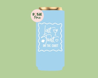 May include: Light blue can cooler with a gold top. The cooler has a white graphic that says "Last Toast on the Coast" with a seashell and a cocktail glass.