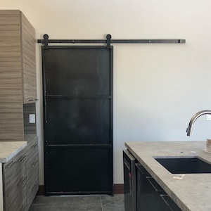 Hand Welded Industrial Metal Sliding Barn Door: Modern Rustic Interior
