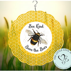 May include: Yellow and white wind spinner with a bee design. The spinner has a honeycomb pattern and the text "Bee Kind Save the Bees".