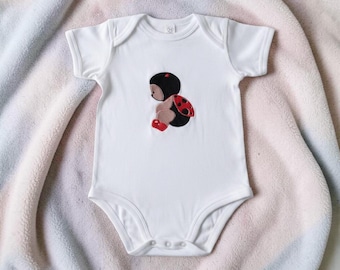 Custom made baby onesies