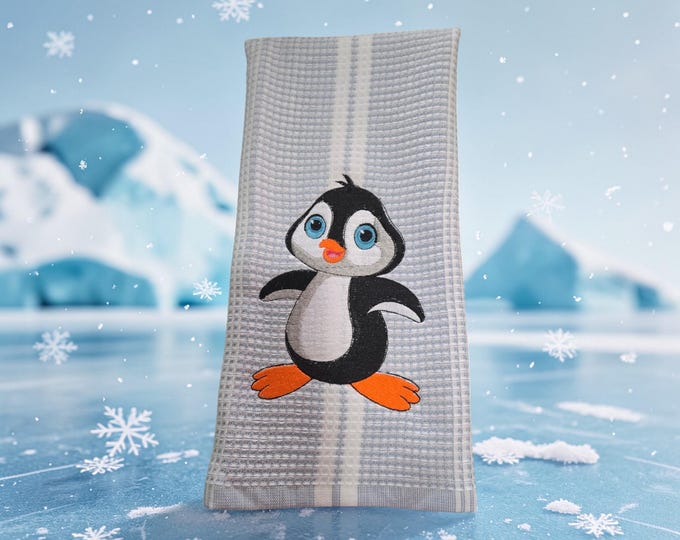 Embroidered penguin towel