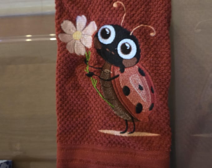 embroidered ladybug towel