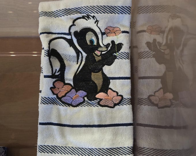 embroidered flower the skunk towel