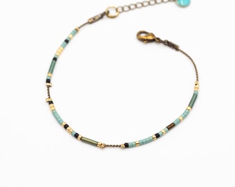 Delicate, minimalist bracelet, Japanese Miyuki glass beads mounted on a thin brass chain, designer jewelry