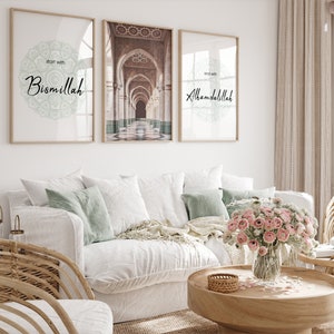 May include: Three framed prints with white backgrounds and black text. The center print features a photograph of an ornate archway in a building. The left print says "start with Bismillah" and the right print says "end with Alhamdulillah".