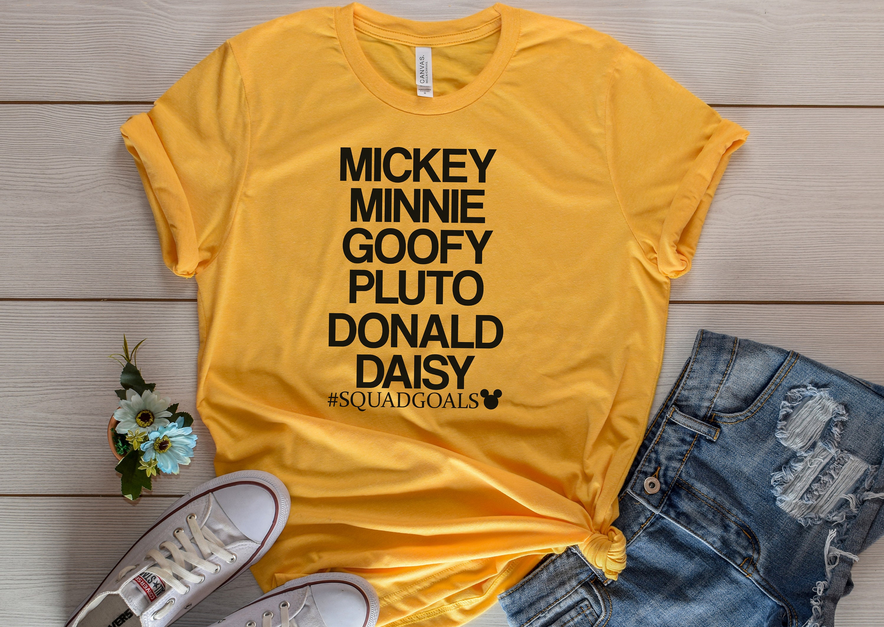 yellow disney shirt