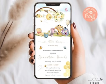 Op de afbeelding: Een Winnie de Poeh-thema baby shower uitnodiging met een aquarel illustratie van Winnie de Poeh, Biggetje, Tijger en Eeyore. De uitnodiging is op een telefoonscherm te zien en bevat de tekst "a little hunny is on the way" en "Please join us for a baby shower honouring Sonantha Brooks".