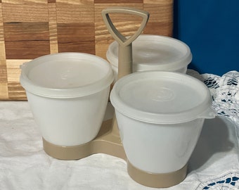 Vintage Tupperware condiment caddy trio stand, Tan Base, cups and lids are White.  PreOwned in very good condition