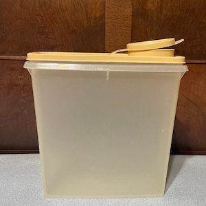 Vintage Tupperware storage food keepers. Choose from containers with tan flip up lid, white container and opaque container, Pre-owned.