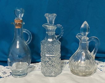 Vintage clear glass cruets, with glass stoppers. Various sizes and shapes. Decanters. Choose your favorite. PreOwned