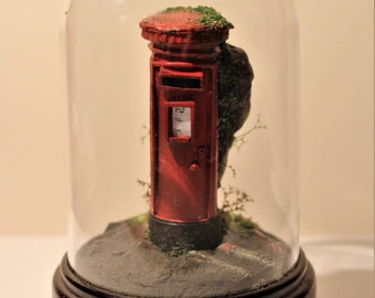 Miniature post box diorama over grown