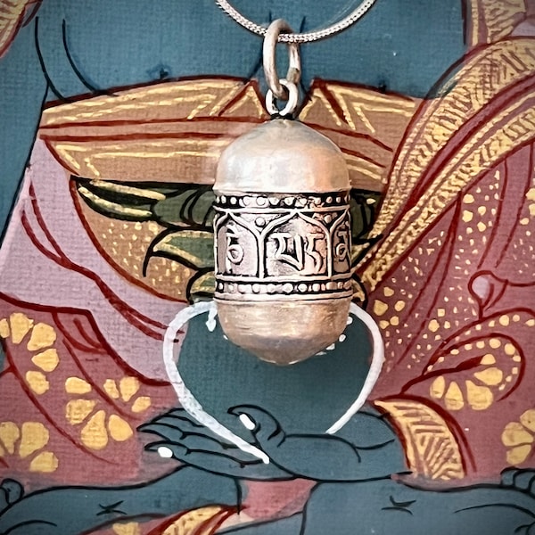 Colgante de caja de oración budista tibetana