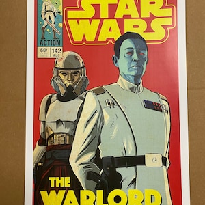 May include: A vintage comic book cover featuring Star Wars characters. The cover is red with yellow text that reads "Star Wars" and "The Warlord". The characters are a white-clad figure with a red cape and a blue-skinned figure with a white uniform and a black belt.