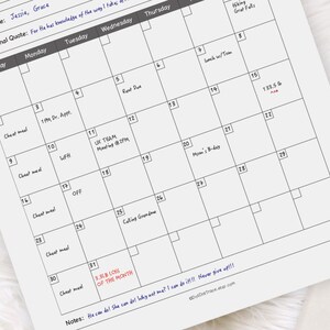 May include: A black and white monthly calendar planner with a grid layout. The calendar has a section for notes at the bottom and includes the text "He can do! She can do! Why not me? I can do it!!! Never give up!!!"