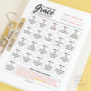 May include: A planner page with the text "21 Days of Grace" and daily prompts for spiritual reflection. The page is in a binder, with a yellow background and black text. The start date is Monday, July 1.