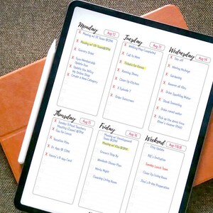 May include: A weekly planner with a black and white grid layout. The planner is divided into days of the week, Monday through Sunday. Each day has a list of tasks and appointments. The planner is on a tablet with a stylus.