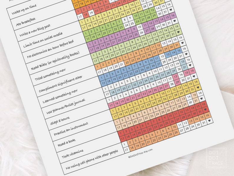Puede incluir: Un rastreador de h&aacute;bitos diario imprimible con un dise&ntilde;o de arco&iacute;ris colorido. El rastreador incluye una lista de h&aacute;bitos diarios para rastrear, como despertarse a tiempo, desayunar, escribir una publicaci&oacute;n de blog, limitar el tiempo en las redes sociales y leer la Biblia. El rastreador tiene una cuadr&iacute;cula de calendario con los n&uacute;meros del 1 al 31 y un icono de coraz&oacute;n al final de cada fila.