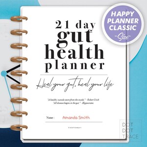May include: A white planner with a black and white design. The planner is titled "21 day gut health planner" and has the text "Heal your gut, heal your life" written in cursive. The planner is a classic size and is perfect for those who want to improve their gut health.