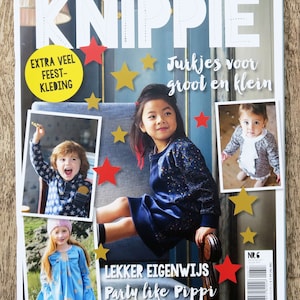 May include: A magazine cover for Knippie, a Dutch sewing magazine, featuring a girl wearing a blue dress with gold stars. The cover text reads "Jurkjes voor groot en klein" and "Lekker Eigenwijs Party like Pippi".